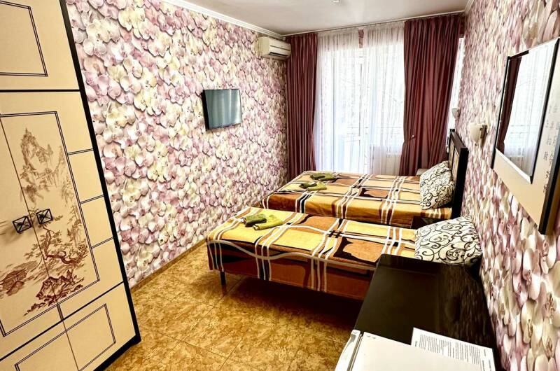 Трехместная комната с балконом