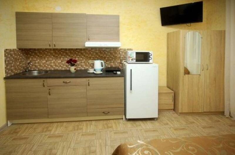 Комната на 4 человека с мини кухней и балконом