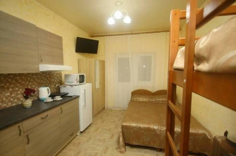 Комната на 4 человека с мини кухней и балконом
