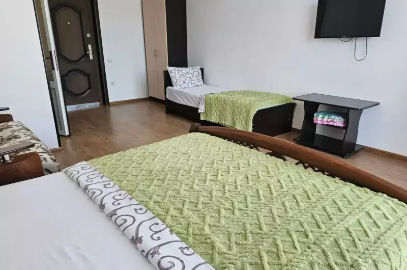 Трехместная комната с балконом