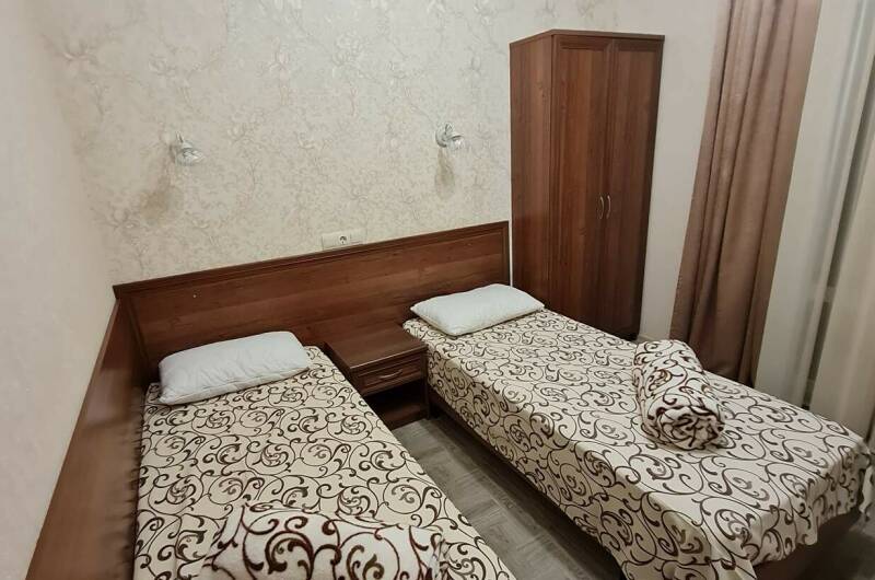 Семейный двухкомнатный номер Делюкс