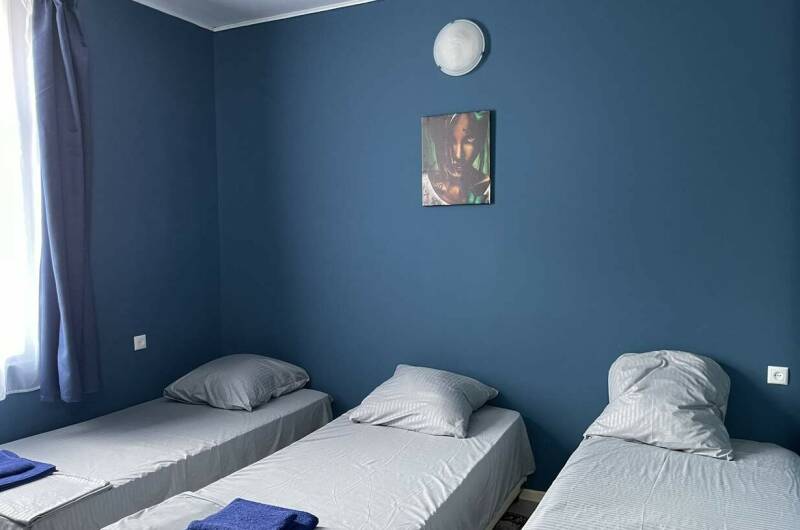 Четырехместный номер с общей кухней на 2 номера