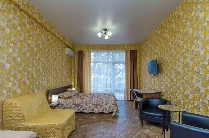 Номер «Студия» с балконом четырехместный