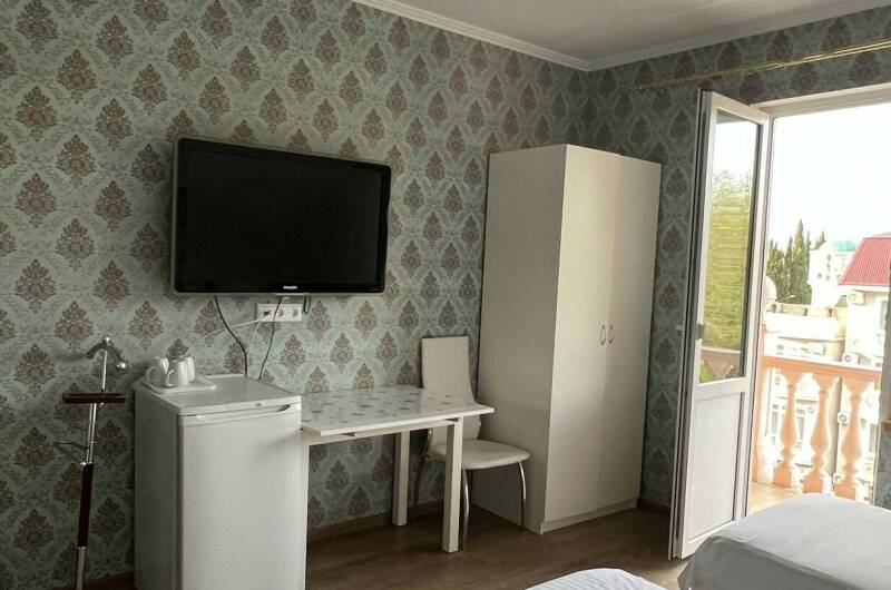 Трехместный номер с балконом