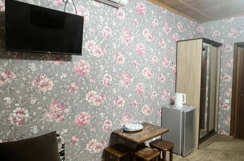 Четырехместная комната стандарт с балконом