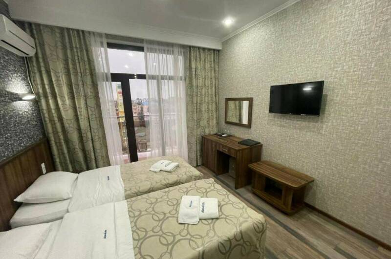 Трехместный номер «Делюкс» с завтраком