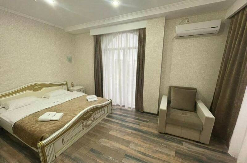 Трехместный номер «Делюкс» с балконом