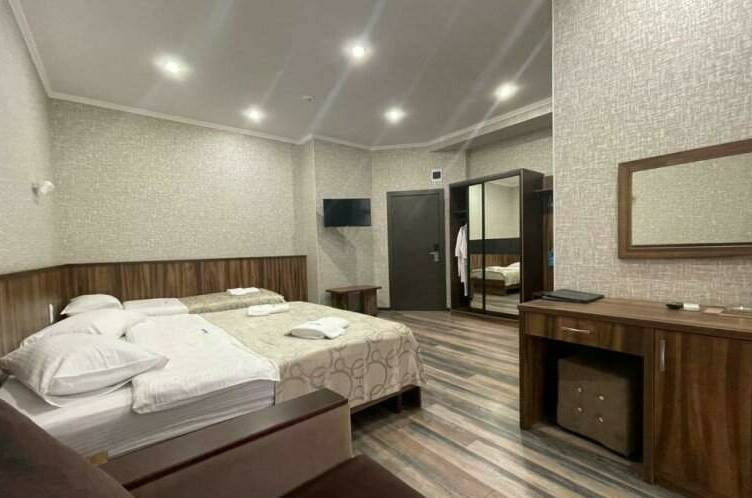 Четырехместный Делюкс с видом на море с завтраком