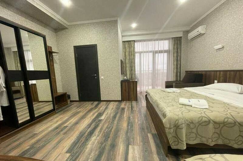 Четырехместный Делюкс с видом на море с питанием