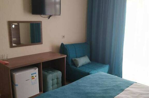 Трехместный номер «Делюкс» с балконом