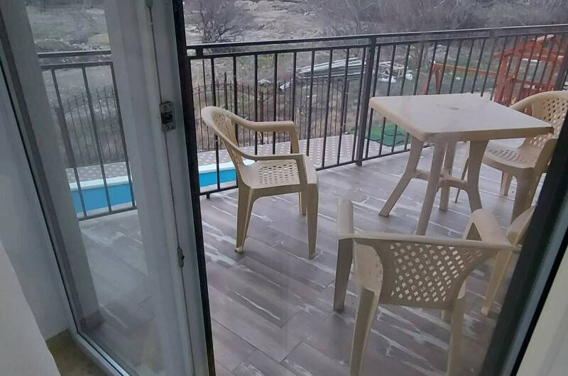 Четырехместный номер «Делюкс» с балконом